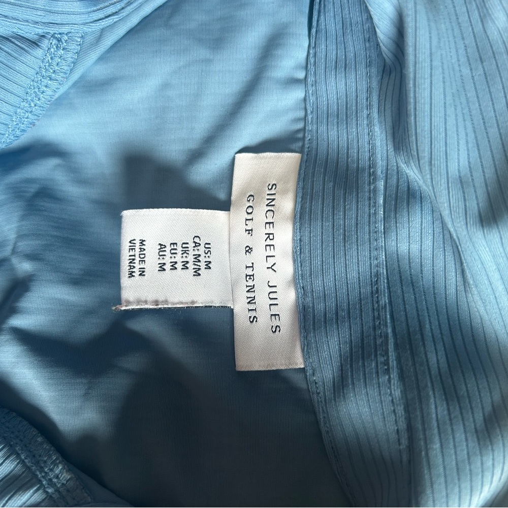Blue collared golf and tennis shirt